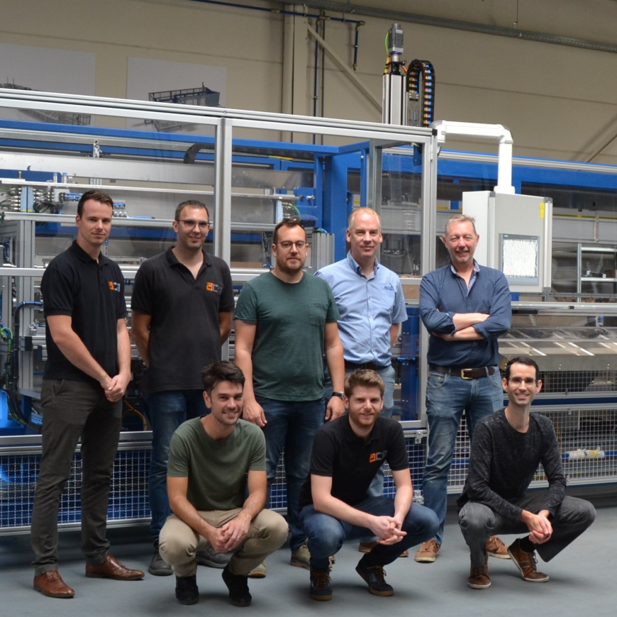  ACE project team at Rockfon, pictured in front of another production line for Rockfon. 